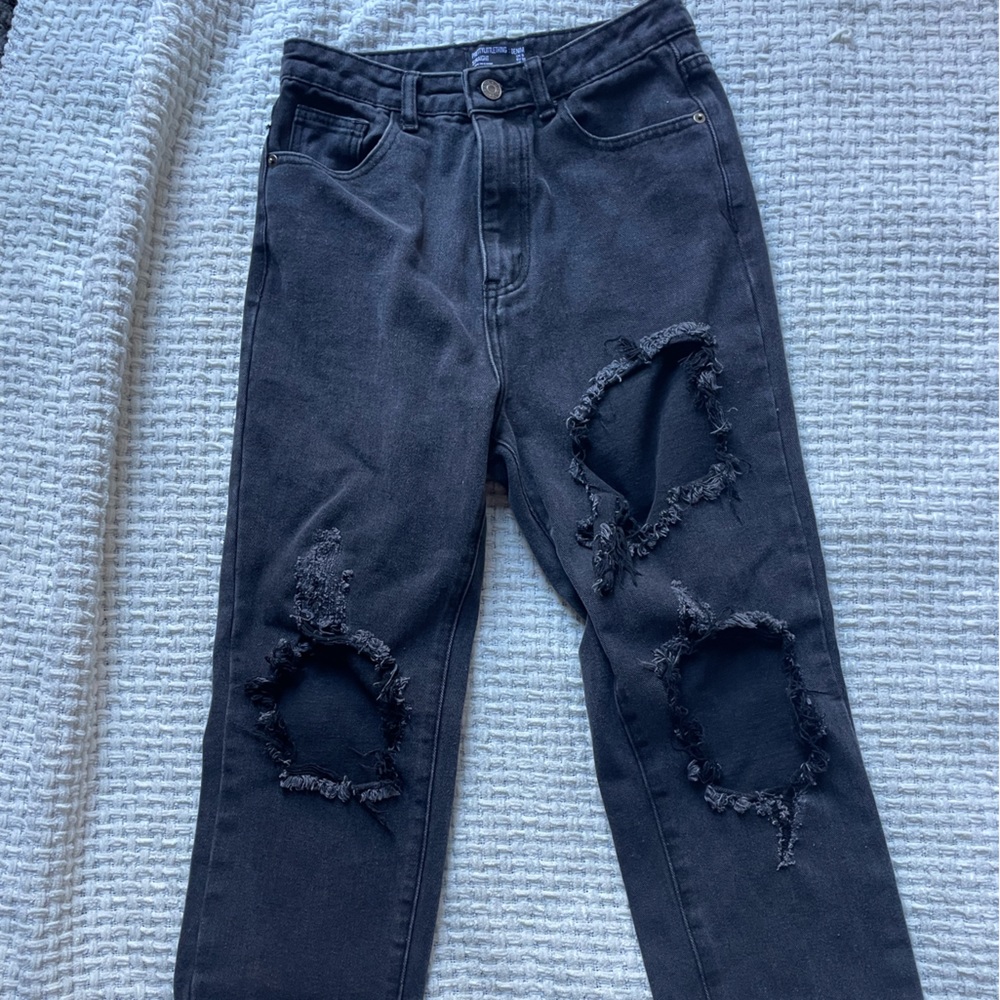 Black jeans with holes